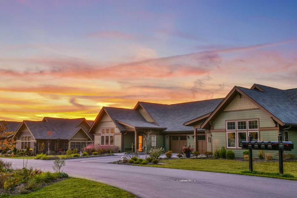 houses with sunset sky at Givens Highland Farms community