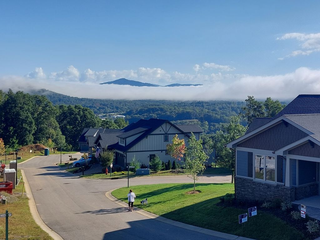 Pinnacle at Arabella community with long range view of low hanging clouds