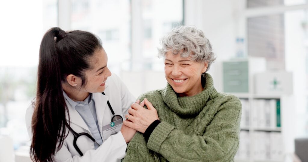 Doctor providing support to a patient