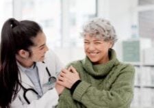 Doctor providing support to a patient
