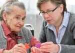 Dimensia Patient with Puzzle Pieces at Retirement Community