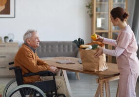 Senior Man with Care Groceries
