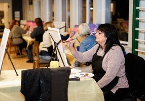 Painting and Sipping Wine Event at Tiny Home Community