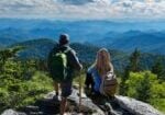 e5a26b99-d81c-4a6d-a8e7-0a0153872628 Active Adults hikers looking out over the Blue Ridge Mountains.